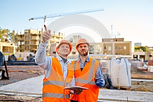 Worker reporting to contractor at construction site