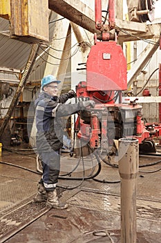 Worker in rig floor