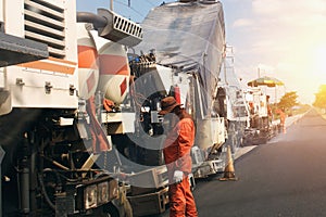 worker road paving construction and asphalt machines