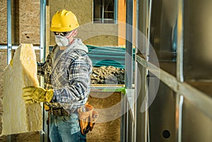 Worker in Safe Breathing Mask Working Inside Developed Building photo
