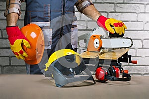 Worker  with safety equipment at workplace.