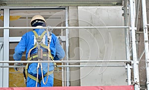 Worker on a scaffold