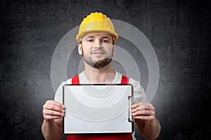 Worker showing blank clipboard