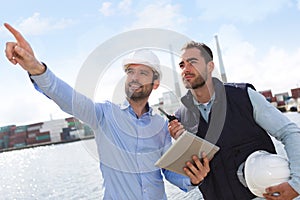 Worker shows to supervisor security system setting up