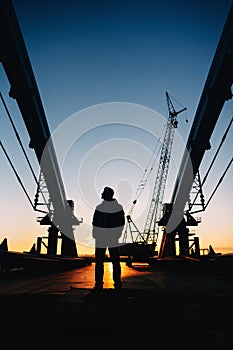 Worker silhouette on construction site