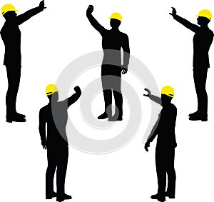 Worker silhouette with yellow protective headgear