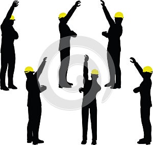 Worker silhouette with yellow protective headgear
