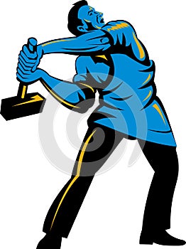 Worker with sledge hammer