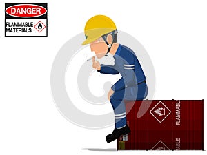 A worker is smoking on the flammable barrel