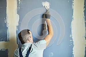 Worker Smoothing Wall Background