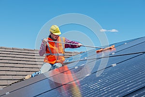 Worker and solar panels