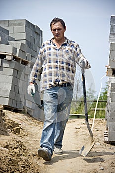 Worker with spade