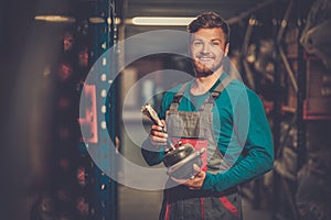 Worker in a spare parts warehouse