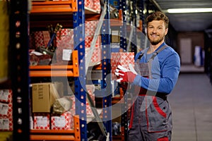 Worker in a spare parts warehouse