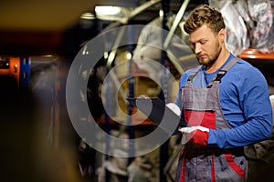 Worker in a spare parts warehouse