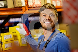 Worker in a spare parts warehouse