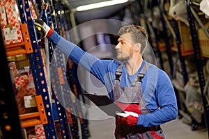 Worker in a spare parts warehouse