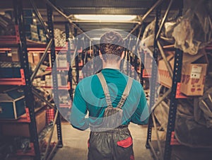 Worker in a spare parts warehouse