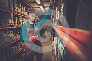 Worker in a spare parts warehouse