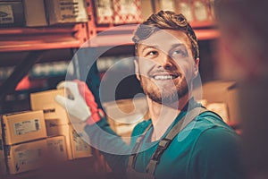 Worker in a spare parts warehouse