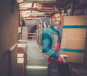 Worker on a spare parts warehouse