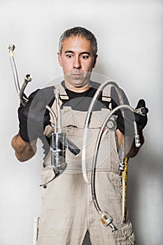 Worker specialist plumber, engineer or constructor on white background