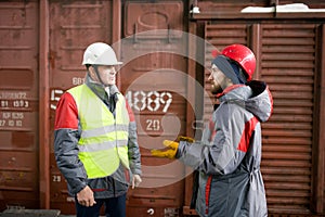 Worker Talking to Supervisor in Docks