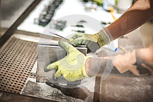 Worker technician work with soft PVC liquid rubber in mold