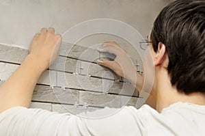 Worker tiler at work