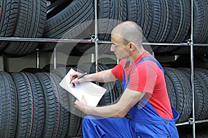 Worker in a tire workshop