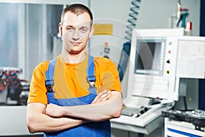 Worker at tool workshop