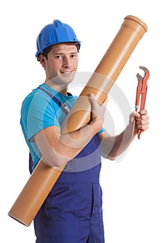 Worker with tube and spanner