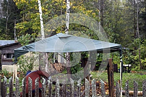 worker under a waterproof tent