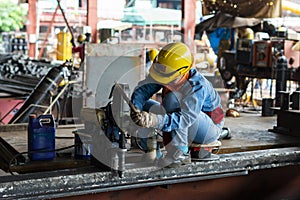 Worker are using a drilling machine to drill a hole equal angles