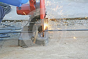 Worker using hand steel shears machine
