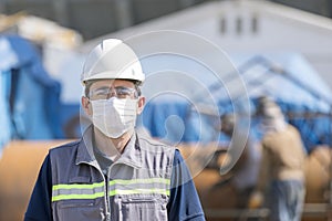 The worker is using personal protective equipments. For healthcare professionals caring for people with covid-19.