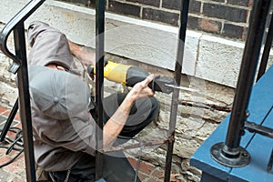 Worker Using Reciprocating Saw