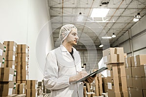 Worker In warehouse for food packaging.