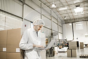 Worker In warehouse for food packaging.