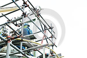 Worker wear safety belt work at hight on scaffolding photo