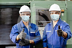 Worker wearing face shield or disposable face mask during working service in factory to prevent CoronavirusCovid-19 or Air dust