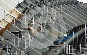 A Worker welding on construction site.