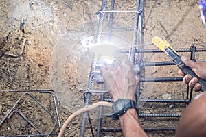 Worker welding steel structure