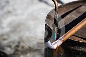 Worker welding on the street photo