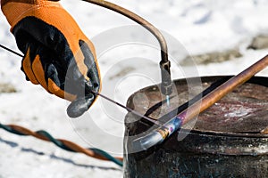 Worker welding on the street photo