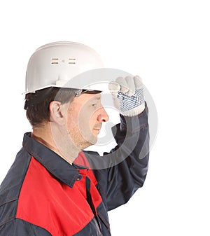 Worker in white hard hat.