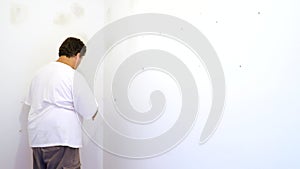 Worker work aligns with a spatula wall