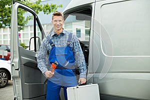 Worker With Work Tool And Toolbox