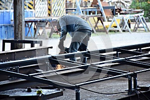 The worker working with steel fabrication factory photo