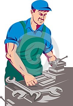 Worker working on lathe machine